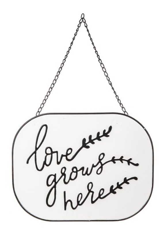 Love Grows Here Metal Sign